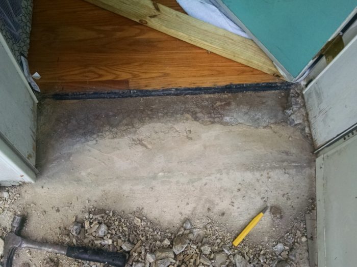 How to repair the concrete sill under our front door